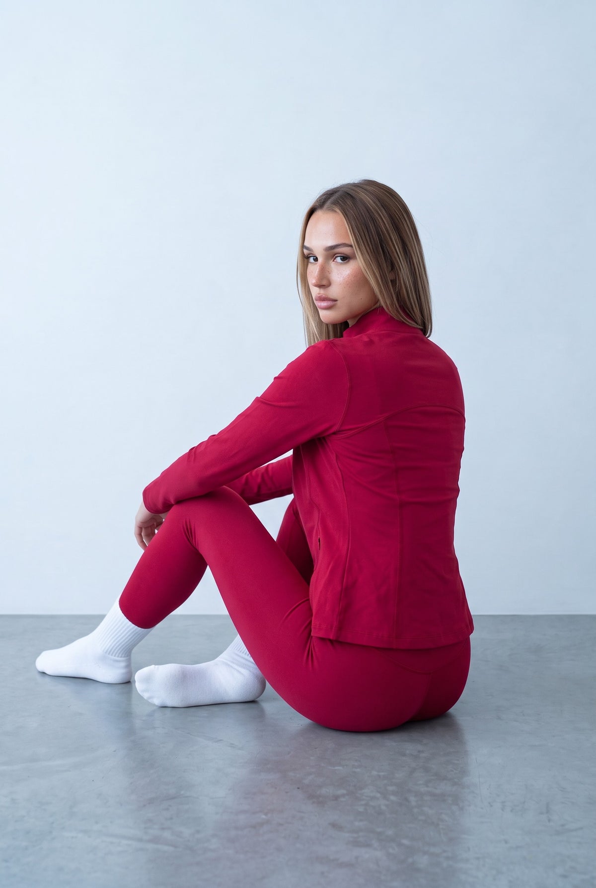 Raspberry sports set, seated side