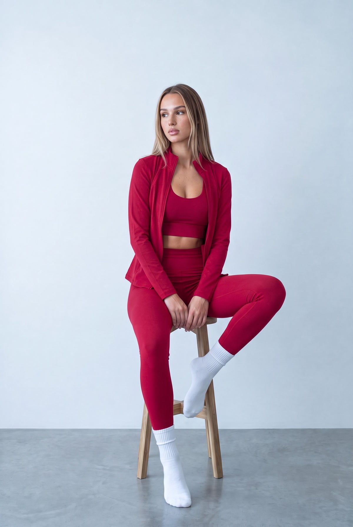 Raspberry sports set, seated on stool