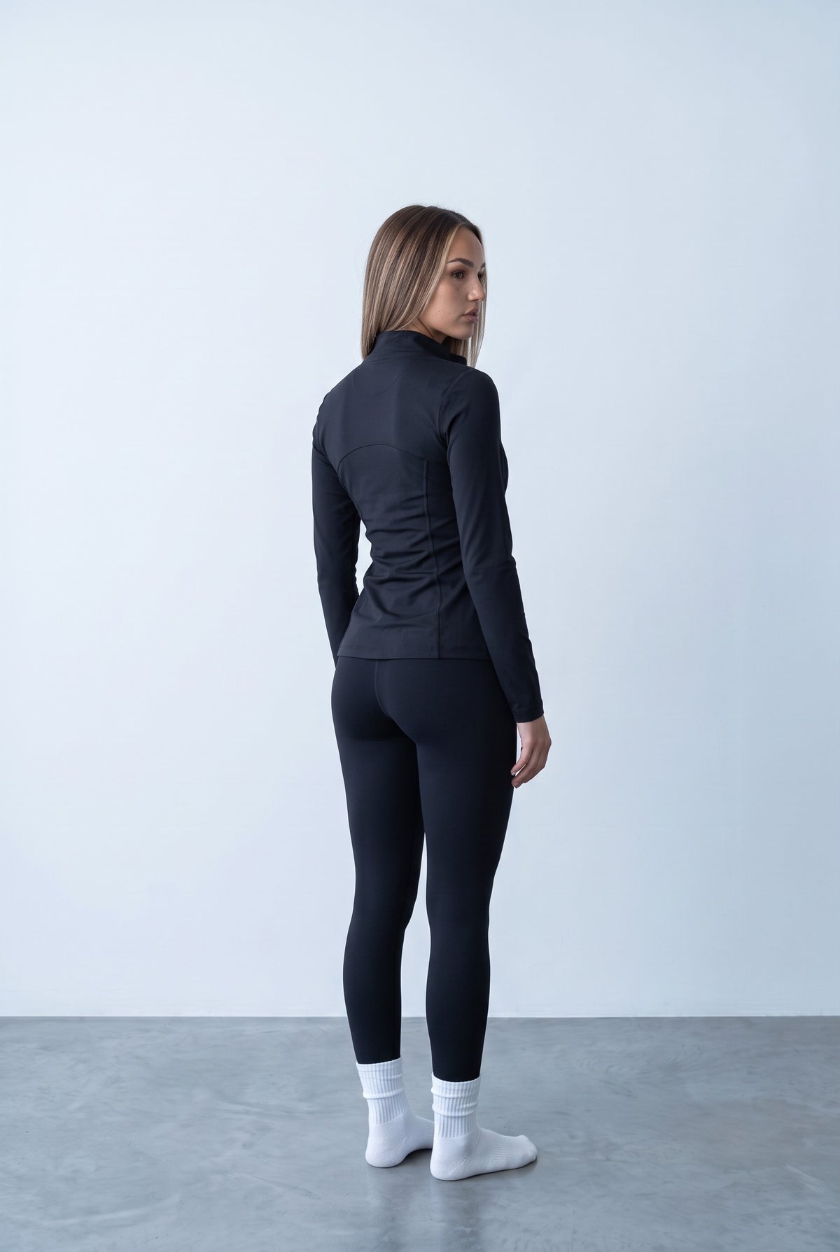 Black sports set, back view