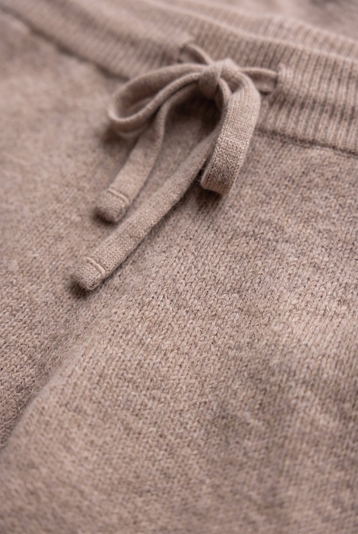 Camel cashmere trousers, fabric detail